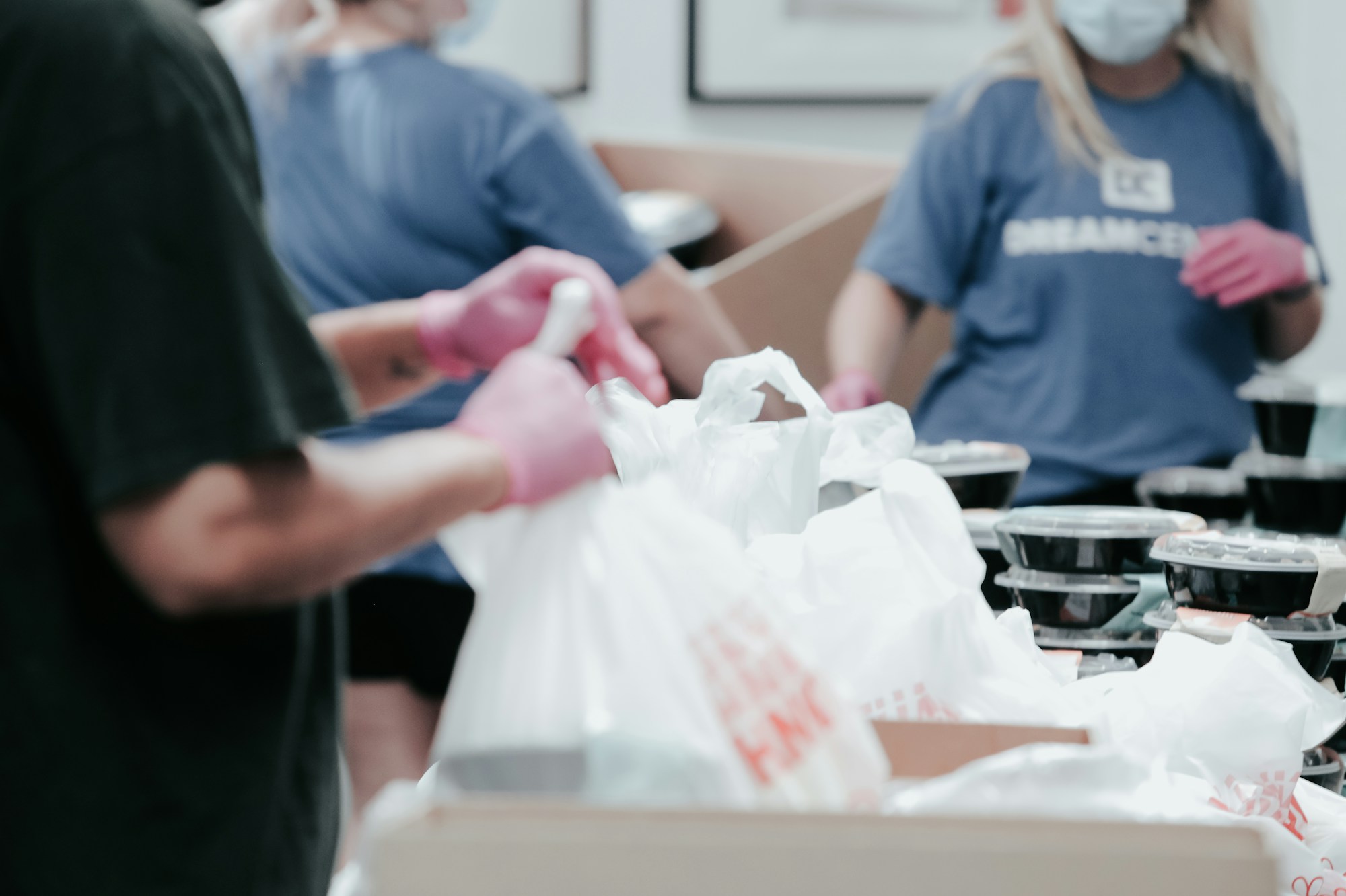 Charity volunteers packing goods